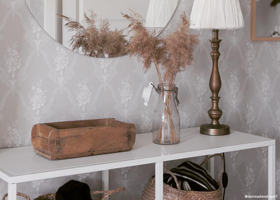 Hall decoration - small storage in woodel bowl, round mirror, bronze lamp