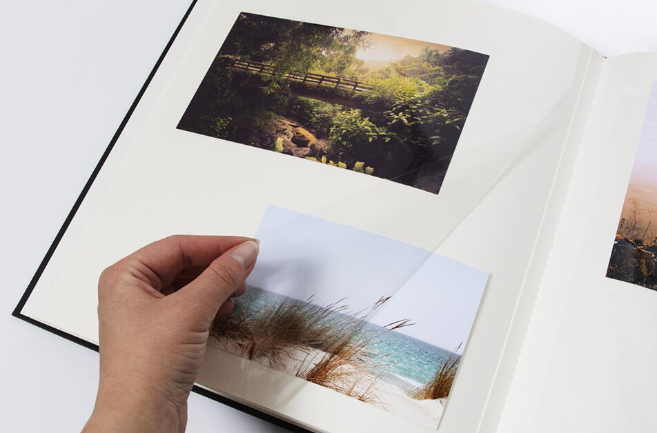 Photo album with self-adhesive pages